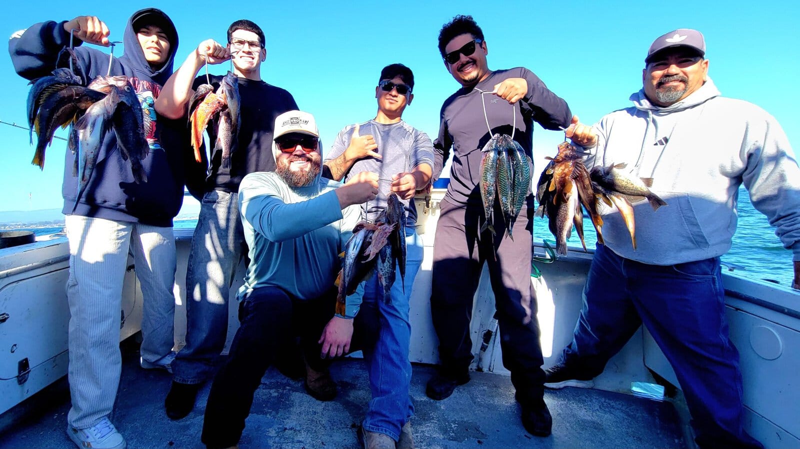 Group of anglers with caught fish